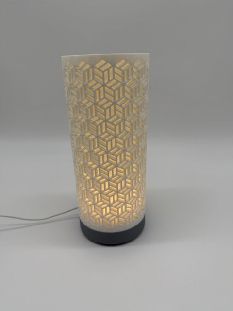 'Dia' table lamp with geometrically cut cylinder shade and sleek base – Modern mood lighting