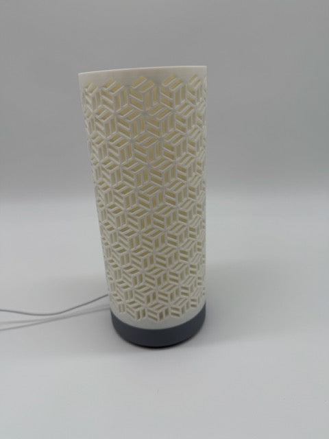 'Dia' table lamp with geometrically cut cylinder shade and sleek base – Modern mood lighting