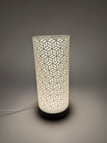 'Dia' table lamp with geometrically cut cylinder shade and sleek base – Modern mood lighting